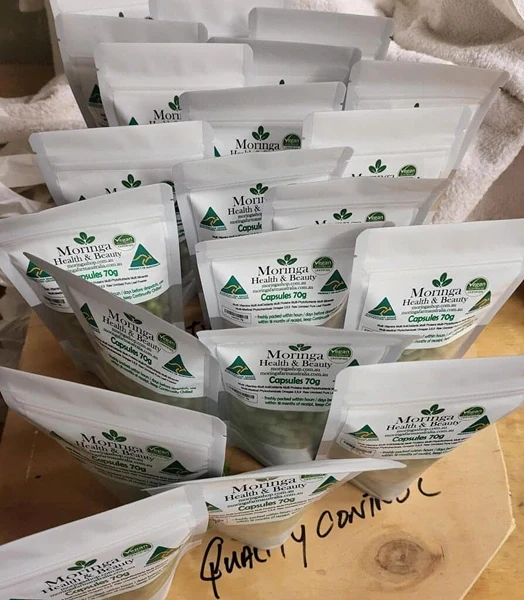 Australian Moringa Encapsulated Packs Multiple Australian Moringa Shop encapsulated moringa packs showing the product packaging and capsules.